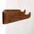 Side view of a wooden wall hanger for bikes