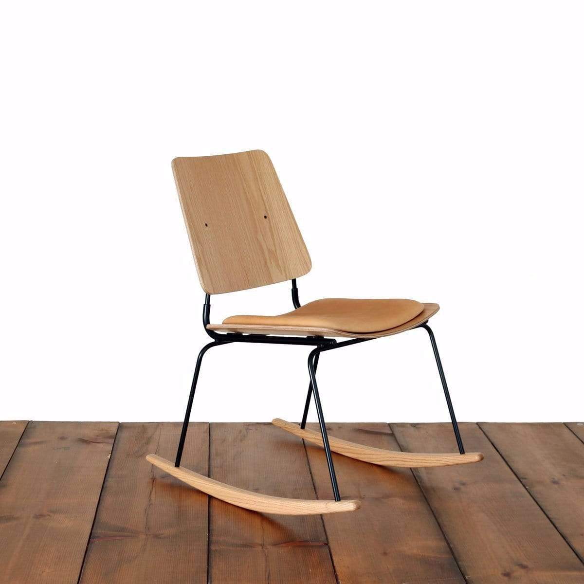 A bent plywood rocking chair with no arms