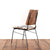 The back of a molded plywood chair