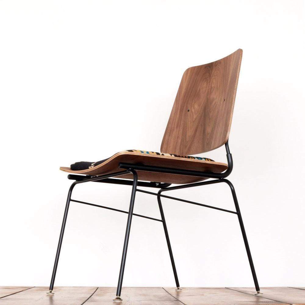 Underneath view of a molded plywood chair